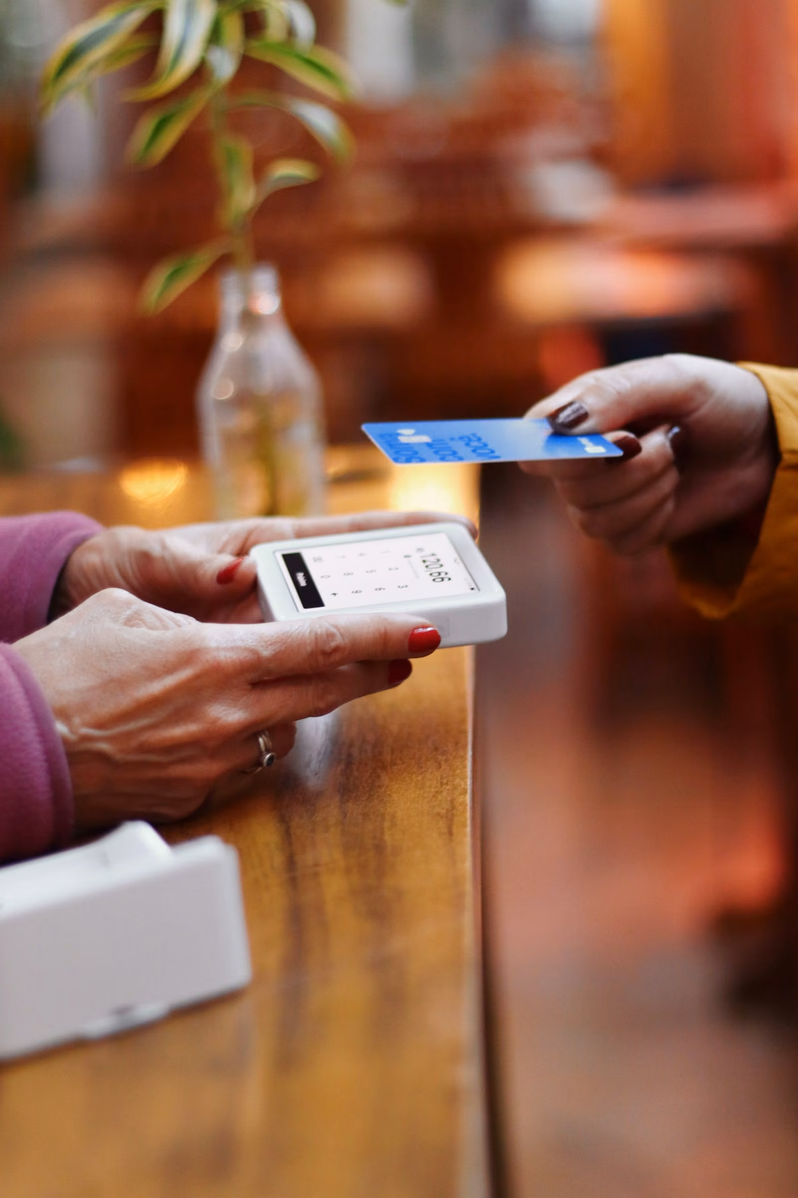 Customer making a contactless payment in a retail store